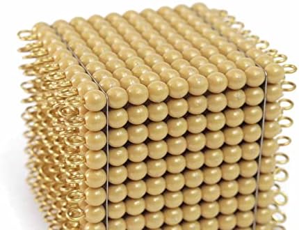 Един златен куб от 1000 мъниста, Отделни Мъниста, Изработени от букова дървесина и пластмаса, Началото на развитието